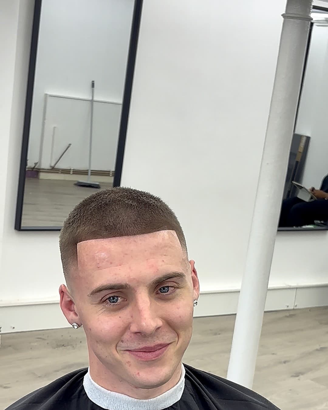 Buzz cut with a sharp line-up